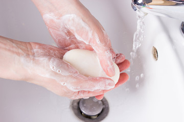 woman washing her hands