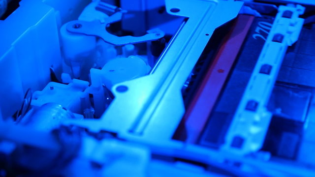 Video tape drive mechanism with loads a different cassettes