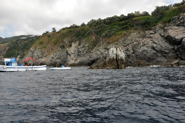 Fototapeta na wymiar barche sulla costa viola in calabria