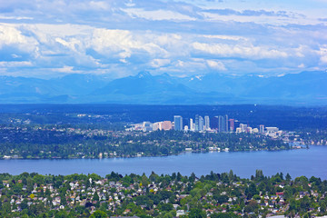 Scenic panorama of suburban Seattle with mountains range. 