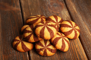 Delicious cookies on brown wooden background