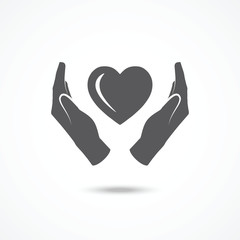 Heart in hands icon