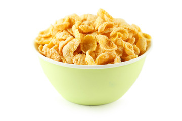 Bowl of cornflakes isolated on white