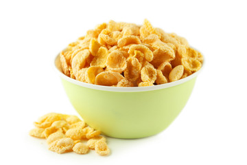 Bowl of cornflakes isolated on white