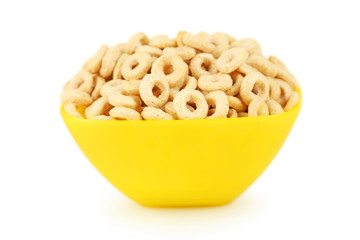 Bowl of cornflakes isolated on white