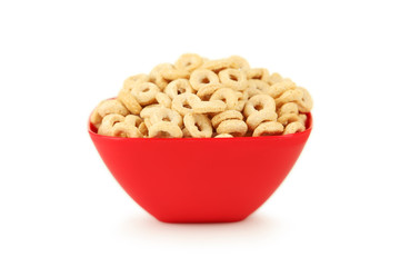 Bowl of cornflakes isolated on white