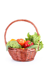 Vegetable in basket isolated on white