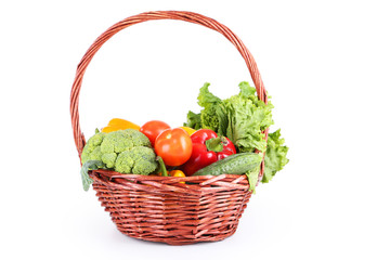 Vegetable in basket isolated on white