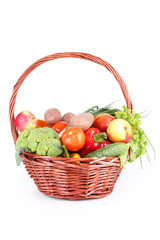 Vegetable in basket isolated on white