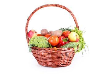 Vegetable in basket isolated on white