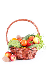 Vegetable in basket isolated on white