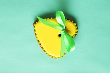 Heart shaped cookies on green background