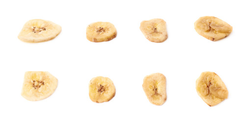 Multiple dried banana slices snacks isolated