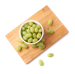 White grapes in a ceramic bowl isolated