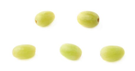 Five single white grapes isolated