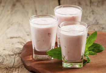 Fresh homemade yogurt berries in glasses, selective focus