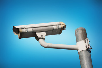 Security Camera or CCTV on blue background