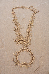 exclamation mark in the sand