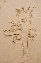 smiley on sand