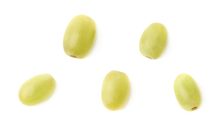 Five single white grapes isolated