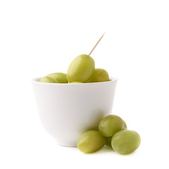 White grapes in a ceramic bowl isolated