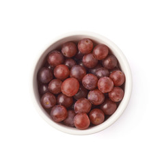 Bowl filled with the dark grapes