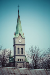 Fototapeta na wymiar Holy Family Church in Zakopane with cross, Poland