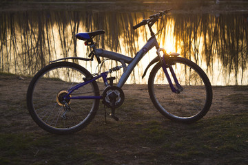 Fototapeta premium bike near a pond