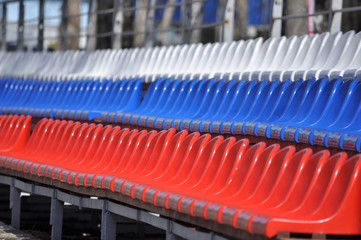 Fototapeta premium Plastic seats in the stadium.