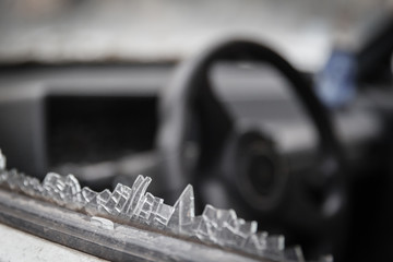 car window smashed by a thief
