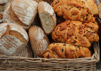 Loaves of Freshly Baked Bread in a Wicker Basket.