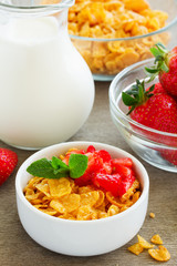 Honey cereals with strawberries for breakfast.