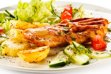 Grilled chicken fillet, boiled potatoes and vegetable salad 