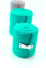 Medical elastic compression bandages on white background