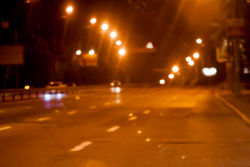 Fototapeta na wymiar blurred night street background with boke