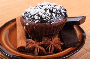 Baked muffins with pieces of chocolate and anise