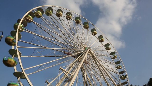 A large ferris wheel at a fair or amusement park