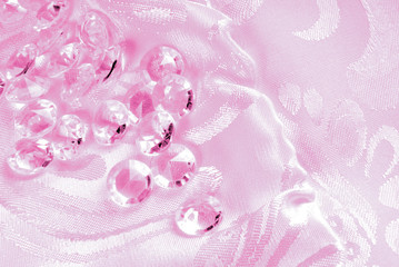 pink diamonds on  floral fabric