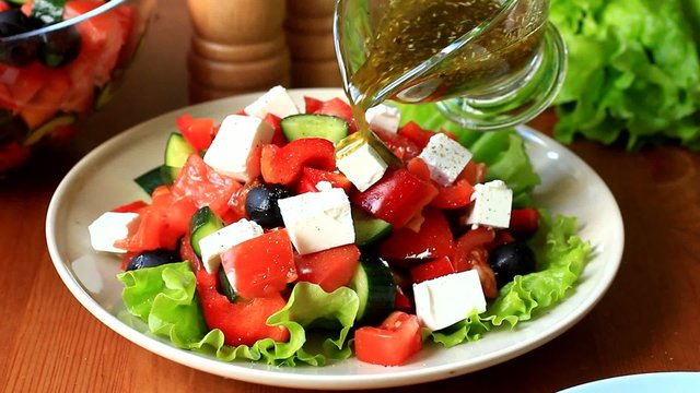 Close up video of cooking traditional greek salad 