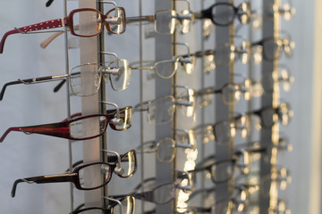 row of glasses at an opticians