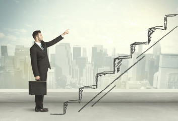 Fototapeta premium Business man climbing up on hand drawn staircase concept