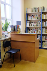 Interior of library with book shelves
