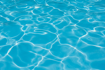 Bright water surface in swimming pool