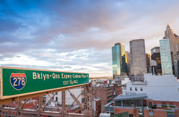 Brooklyn Bridge traffic sign and Downtown Manhattan