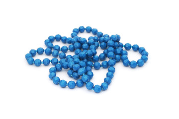 old blue plastic bead necklace on white background