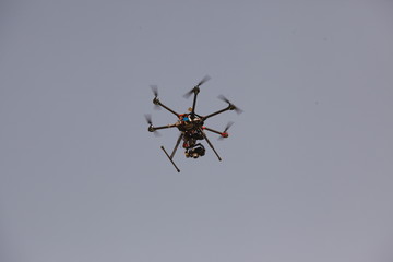 Aerial drone quadracopter with an action camera