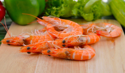  boiled shrimps  on wood board
