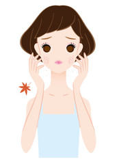 頬の乾燥に悩む女性