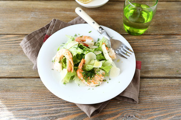 Tasty Salad with shrimps, lettuce and parmesan