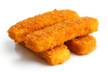 Four golden fried fish fingers stacked on white.